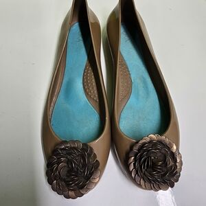 OKA b. Tan Flats with Bronze Floral Accent